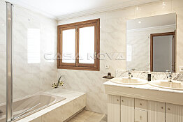 Bright bathroom with tub and shower